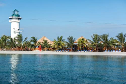 Harvest Caye Joins Community in Local Beach Cleanup Efforts
