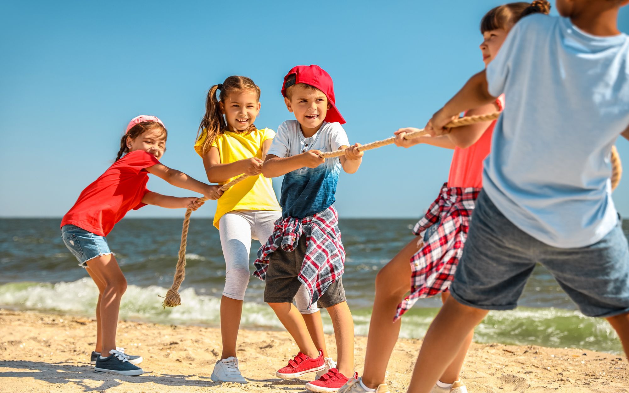 Skip The Dull Vacation Moments & Try These Fun Family Beach Games